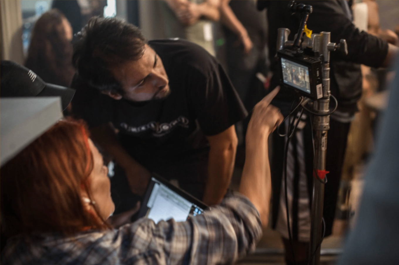 Anne Welles and Aitor at the monitor on set